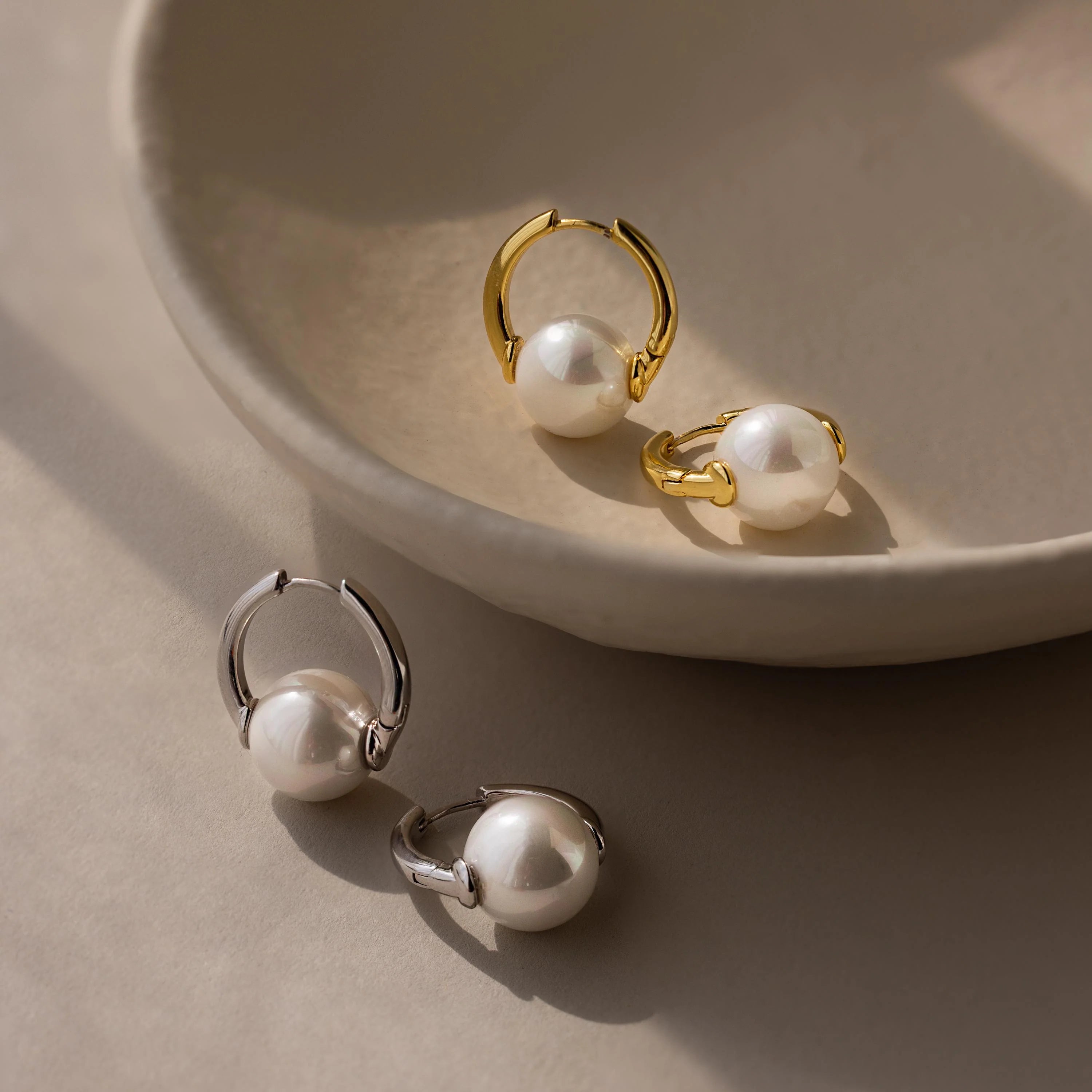 Dainty yet bold hoop earrings with round pearls